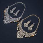 Wholesale Feather Pearl Set featuring a CZ leaf bib necklace with dangling colorful shell pearls on gold plated copper from JuneJewelry.com.