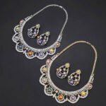 Wholesale Scallop Pearl Set featuring CZ scalloped lace arches with colorful shell pearls on gold plated copper from JuneJewelry.com.