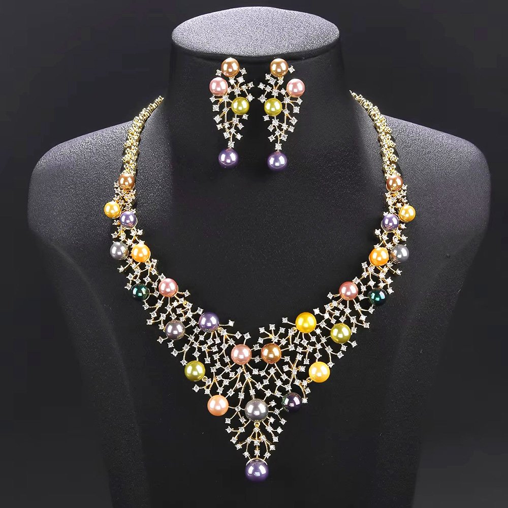 Wholesale Lattice Pearl Set featuring a CZ branch grid collar with colorful shell pearls on gold plated copper from JuneJewelry.com.