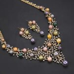 Wholesale Lattice Pearl Set featuring a CZ branch grid collar with colorful shell pearls on gold plated copper from JuneJewelry.com.