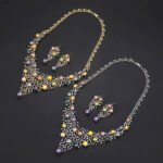 Wholesale Lattice Pearl Set featuring a CZ branch grid collar with colorful shell pearls on gold plated copper from JuneJewelry.com.