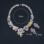 Wholesale Rose Pearl Set featuring CZ paved rose blooms with colorful shell pearls on gold plated copper from JuneJewelry.com.