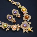 Wholesale Rose Pearl Set featuring CZ paved rose blooms with colorful shell pearls on gold plated copper from JuneJewelry.com.
