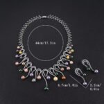 Wholesale Swirl Pearl Set featuring CZ micro paved S-curve links with dangling colorful shell pearls on gold plated copper from JuneJewelry.com.