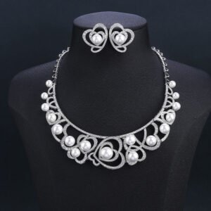 Wholesale Heart Pearl Set featuring CZ paved heart motifs cradling colorful shell pearls on gold plated copper from JuneJewelry.com.