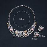 Wholesale Heart Pearl Set featuring CZ paved heart motifs cradling colorful shell pearls on gold plated copper from JuneJewelry.com.