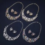 Wholesale Heart Pearl Set featuring CZ paved heart motifs cradling colorful shell pearls on gold plated copper from JuneJewelry.com.
