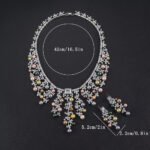 Wholesale Cascade Pearl Set featuring a CZ vine fringe collar with dangling colorful shell pearls on gold plated copper from JuneJewelry.com.