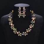 Wholesale Foliage Pearl Set featuring CZ micro paved leaf branches with colorful shell pearls on gold plated copper from JuneJewelry.com.