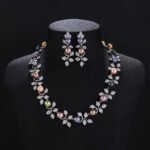 Wholesale Foliage Pearl Set featuring CZ micro paved leaf branches with colorful shell pearls on gold plated copper from JuneJewelry.com.