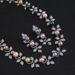 Wholesale Foliage Pearl Set featuring CZ micro paved leaf branches with colorful shell pearls on gold plated copper from JuneJewelry.com.