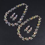 Wholesale Foliage Pearl Set featuring CZ micro paved leaf branches with colorful shell pearls on gold plated copper from JuneJewelry.com.