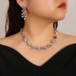 Wholesale Foliage Pearl Set featuring CZ micro paved leaf branches with colorful shell pearls on gold plated copper from JuneJewelry.com.