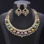 Wholesale Shield Pearl Set featuring CZ micro paved arched plates with colorful shell pearls and marquise leaves on gold plated copper from JuneJewelry.com.