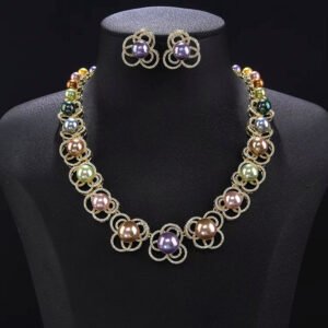 Wholesale Petal Pearl Set featuring CZ micro paved flower motifs with colorful shell pearls on gold plated copper from JuneJewelry.com.