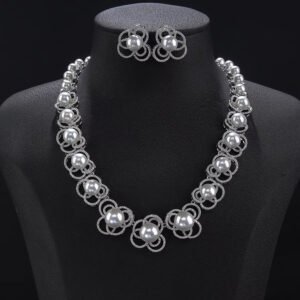 Wholesale Petal Pearl Set featuring CZ micro paved flower motifs with colorful shell pearls on gold plated copper from JuneJewelry.com.