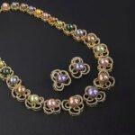 Wholesale Petal Pearl Set featuring CZ micro paved flower motifs with colorful shell pearls on gold plated copper from JuneJewelry.com.