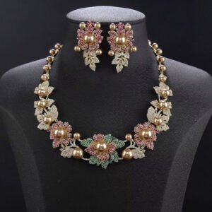 Wholesale Floral Pearl Set featuring pink green CZ flowers and champagne shell pearls on gold plated copper from JuneJewelry.com.