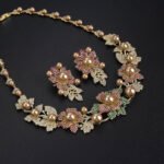 Wholesale Floral Pearl Set featuring pink green CZ flowers and champagne shell pearls on gold plated copper from JuneJewelry.com.