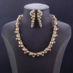 Wholesale Cluster Pearl Set featuring champagne shell pearls and CZ leaf motifs on gold plated copper from JuneJewelry.com.