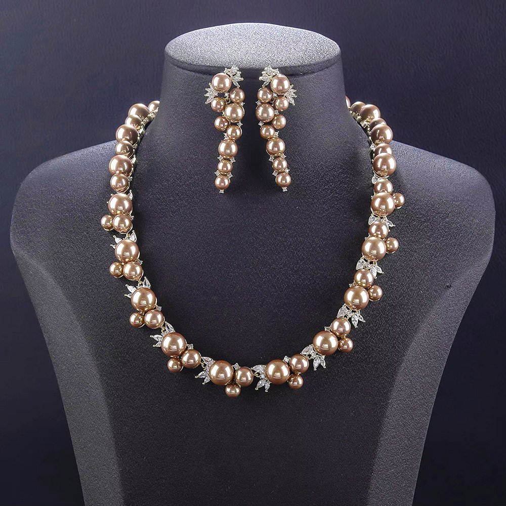 Wholesale Cluster Pearl Set featuring champagne shell pearls and CZ leaf motifs on gold plated copper from JuneJewelry.com.