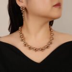 Wholesale Cluster Pearl Set featuring champagne shell pearls and CZ leaf motifs on gold plated copper from JuneJewelry.com.