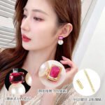 Emerald cut CZ freshwater pearl drop earrings featuring a radiant-cut cubic zirconia stud above a round freshwater pearl with 925 sterling silver ear posts
