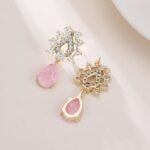 Tear drop crackle CZ teardrop earrings featuring a crystal halo teardrop stud with a suspended ice-crackle gemstone drop and 925 sterling silver ear posts.