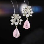 Tear drop crackle CZ teardrop earrings featuring a crystal halo teardrop stud with a suspended ice-crackle gemstone drop and 925 sterling silver ear posts.