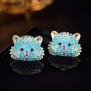 Tiger head CZ turquoise stud earrings featuring micro-pave cubic zirconia tiger motif with 925 sterling silver posts available on junejewelry.com