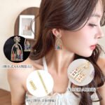 Whimsical fairytale castle arch drop earrings featuring firework star stud topper, pavé frame, and colorful CZ geometric crystal castle towers.