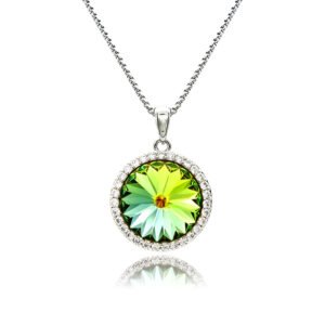 Swarovski element crystal round pendant necklace featuring a micro-paved cubic zirconia halo frame, brass base, premium palladium silver plating, and high-shine box chain.