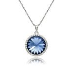 Swarovski element crystal round pendant necklace featuring a micro-paved cubic zirconia halo frame, brass base, premium palladium silver plating, and high-shine box chain.