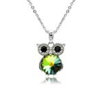 Swarovski crystal owl necklace wholesale featuring black crystal eyes, palladium plated brass frame, shiny link chain, and sparkling round crystal body in multiple colors.
