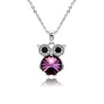 Swarovski crystal owl necklace wholesale featuring black crystal eyes, palladium plated brass frame, shiny link chain, and sparkling round crystal body in multiple colors.
