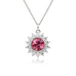 Swarovski crystal flower pendant wholesale featuring brilliant round crystal centerpiece, cubic zirconia starburst halo, palladium-plated brass base, and delicate silver chain.