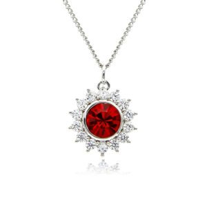 Swarovski crystal flower pendant wholesale featuring brilliant round crystal centerpiece, cubic zirconia starburst halo, palladium-plated brass base, and delicate silver chain.