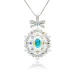 Swarovski crystal bow pendant wholesale featuring palladium plated brass chain, ornate ribbon bow, pearl cluster frame, and oval gemstone, SKU G100898E.