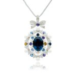 Swarovski crystal bow pendant wholesale featuring palladium plated brass chain, ornate ribbon bow, pearl cluster frame, and oval gemstone, SKU G100898E.