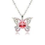 Swarovski crystal butterfly frame pendant necklace in palladium-plated brass with pave zircon filigree wings and centered geometric cube crystal, SKU G100954E.
