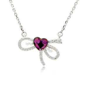 Swarovski crystal heart bow necklace wholesale made with palladium plated brass chain, pave cz bowknot, dainty pearl accents, and heart crystal, SKU G101034E.