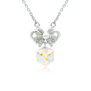 Swarovski crystal bow ribbon necklace wholesale featuring palladium plated brass chain, pave cz bowknot with center pearl, and dangling cube crystal, SKU G101037E.