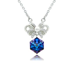 Swarovski crystal bow ribbon necklace wholesale featuring palladium plated brass chain, pave cz bowknot with center pearl, and dangling cube crystal, SKU G101037E.