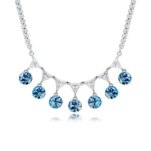 Swarovski crystal fringe necklace featuring 7 dangling round crystals hanging from a paved brass tennis chain base in palladium finish, SKU G101248E.