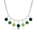 Swarovski crystal fringe necklace featuring 7 dangling round crystals hanging from a paved brass tennis chain base in palladium finish, SKU G101248E.