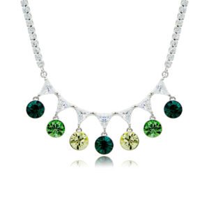 Swarovski crystal fringe necklace featuring 7 dangling round crystals hanging from a paved brass tennis chain base in palladium finish, SKU G101248E.