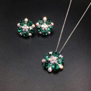 Wholesale floral crystal jewelry set featuring platinum plated copper with fuchsia pink Swarovski element crystals from JuneJewelry.com.