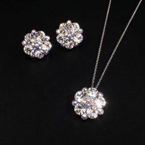 Wholesale floral crystal jewelry set featuring platinum plated copper with fuchsia pink Swarovski element crystals from JuneJewelry.com.