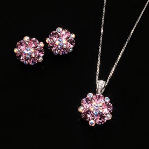 Wholesale floral crystal jewelry set featuring platinum plated copper with fuchsia pink Swarovski element crystals from JuneJewelry.com.