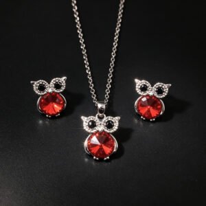 Wholesale owl crystal jewelry set featuring platinum plated copper with blue Swarovski element crystal body and pave zirconia eyes from JuneJewelry.com.